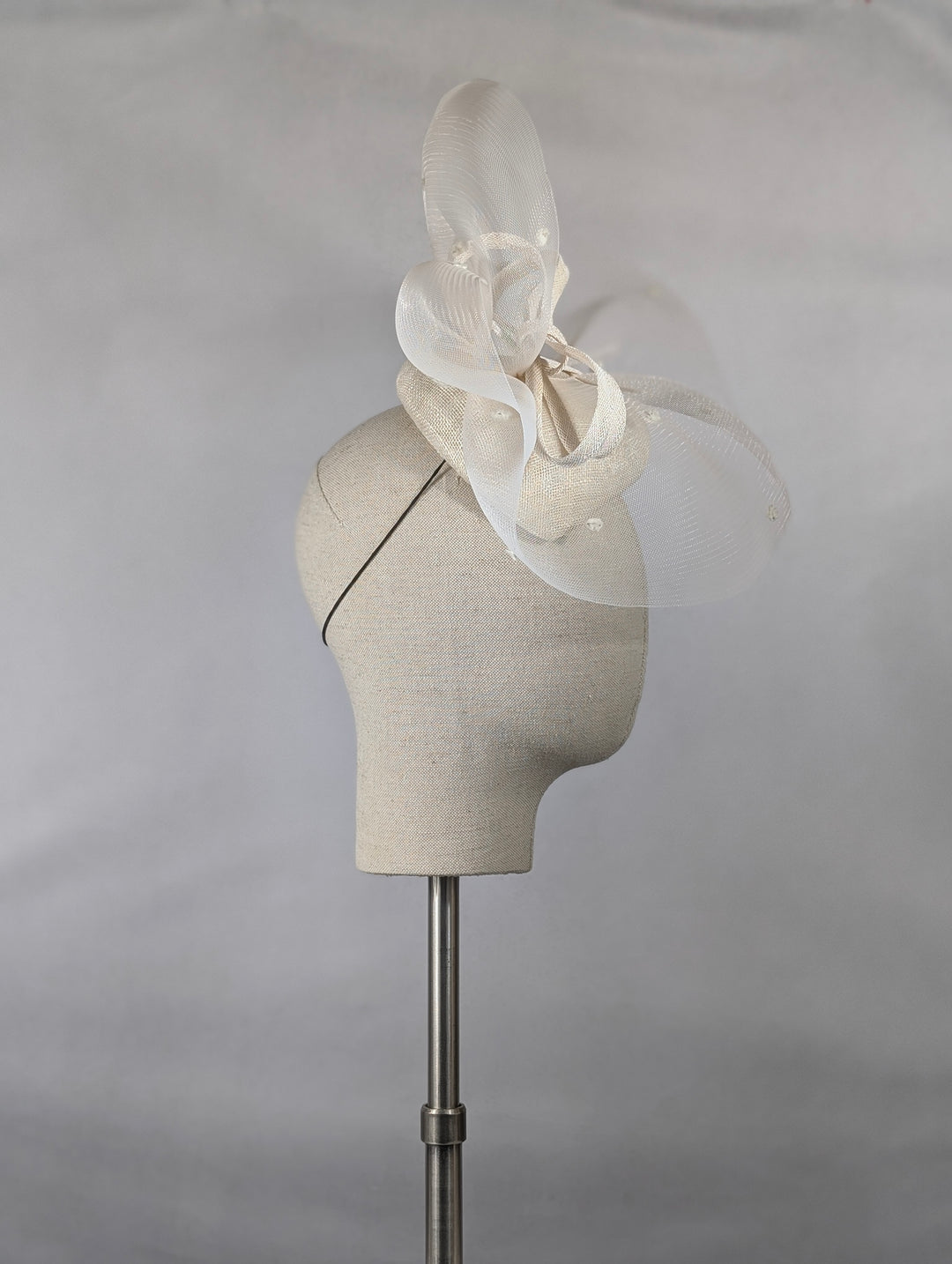 "Ivory Sweep" cocktail hat