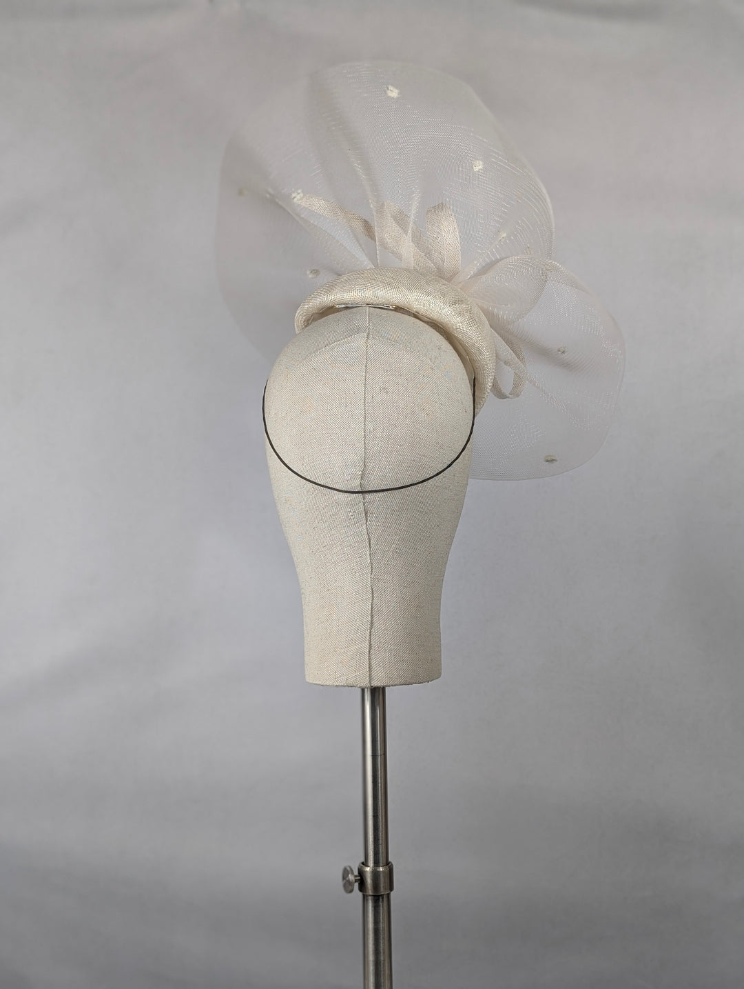 "Ivory Sweep" cocktail hat
